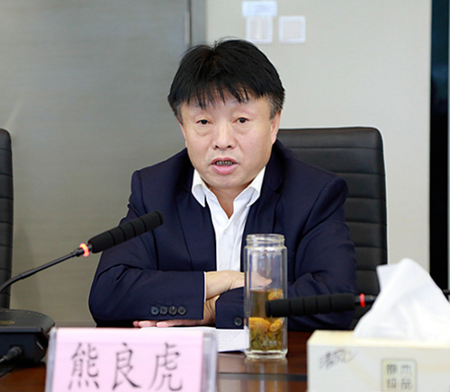 熊良虎会见陕西地电（集团）公司党委书记、、、董事长邹满绪